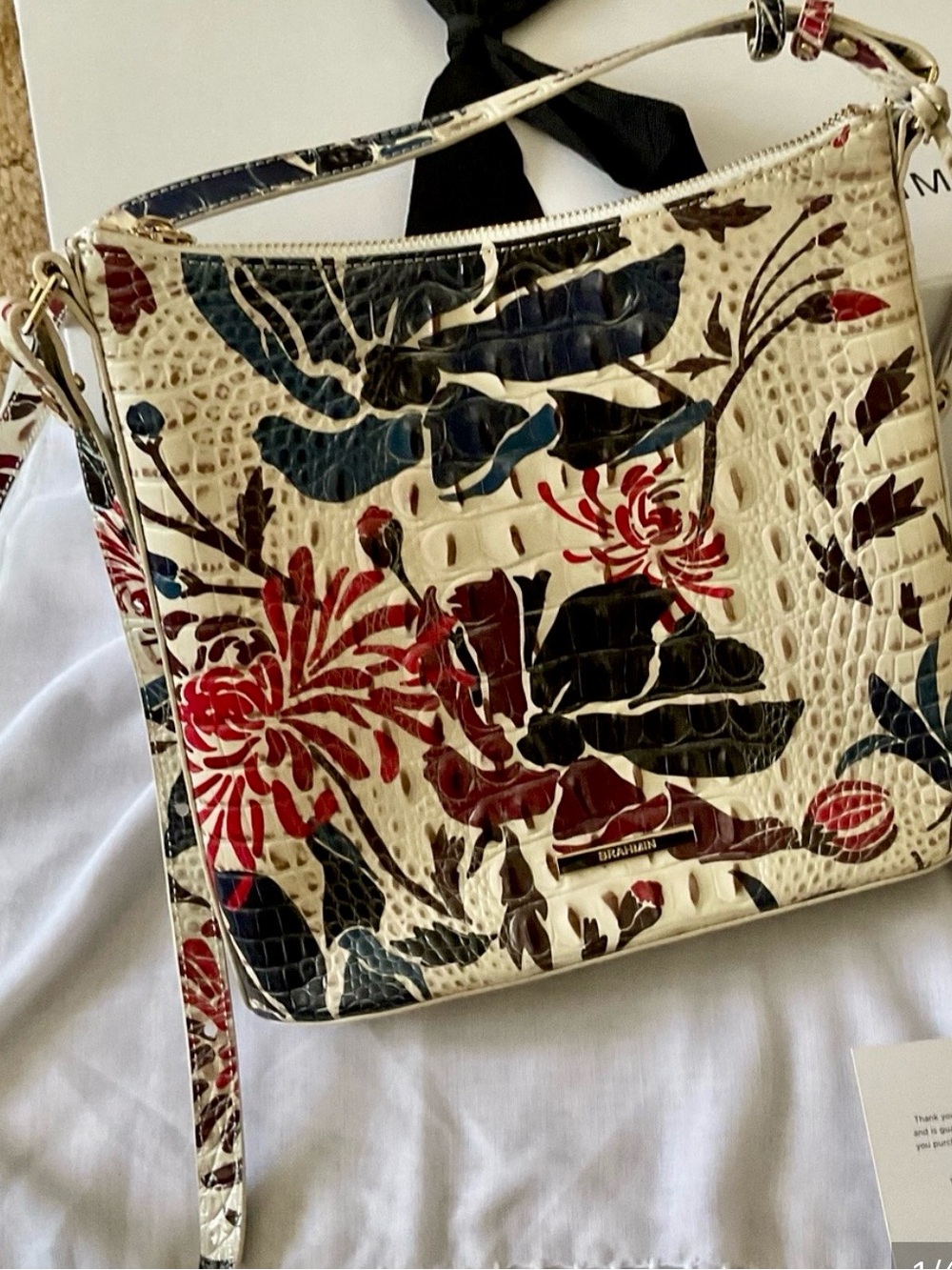 Like new – Brahmin Floral Embossed Leather Crossbody Bag in Cream, Red, Navy